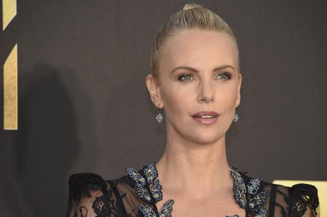 Charlize Theron won the first award of the night--best female performance for Mad Max: Fury Road. (REUTERS)