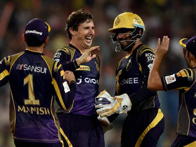 KKR Bowler Brad Hogg jubiliate with his teammates after dismissal of Delhi Daredevils batsman Pawan Negi at Eden Gardens. (PTI Photo)
