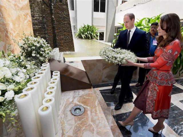 Prince William, Duke of Cambridge and Catherine, Duchess of Cambridge during the wreath laying ceremony on the martyrs memorial at Taj Mahal Palace Hotel in Mumbai on Sunday. (PTI) Prince William, Duke of Cambridge and Catherine, Duchess of Cambridge during the wreath laying ceremony on the martyrs memorial at Taj Mahal Palace Hotel in Mumbai on Sunday. (PTI)