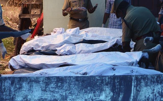 Bodies of victims lie outside a morgue at the Kollam district hospital after a fire broke out during a fireworks display at the Puttingal temple complex in Paravur, Kollam district. (AP Photo) Bodies of victims lie outside a morgue at the Kollam district hospital after a fire broke out during a fireworks display at the Puttingal temple complex in Paravur, Kollam district. (AP Photo)