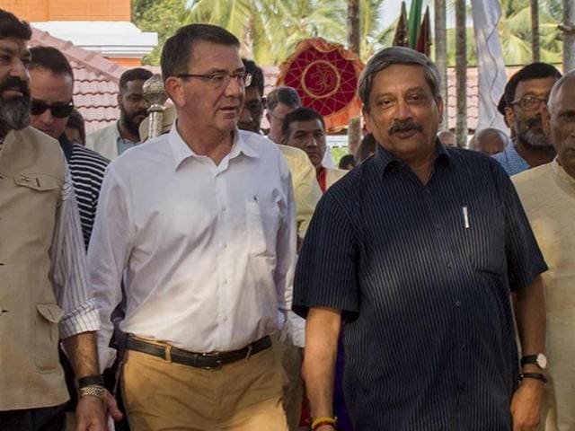 US defence secretary Ash Carterwalks with Indian defence minister Manohar Parrikar as they tour the Mangeshi Temple in Old Goa on Sunday. (AFP) US defence secretary Ash Carterwalks with Indian defence minister Manohar Parrikar as they tour the Mangeshi Temple in Old Goa on Sunday. (AFP)