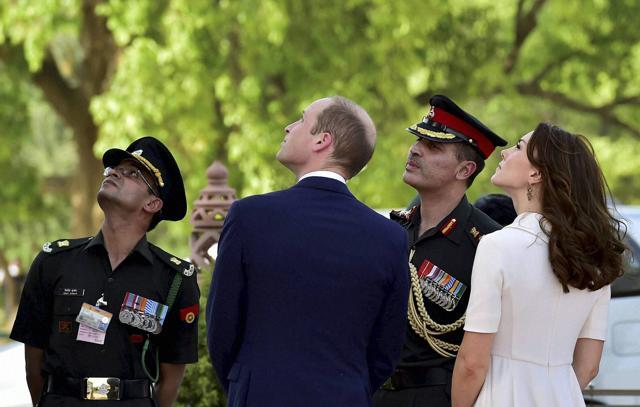 The couple at India Gate. “Never forgetting those who have made their ultimate sacrifice for India,” they said in message they left at the memorial. (PTI)