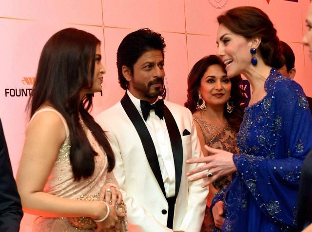 Catherine, Duchess of Cambridge meeting actors Aishwarya Rai Bachchan, Madhuri Dikshit and Shah Rukh Khan during the Bollywood theme dinner in Mumbai on Sunday. (PTI)