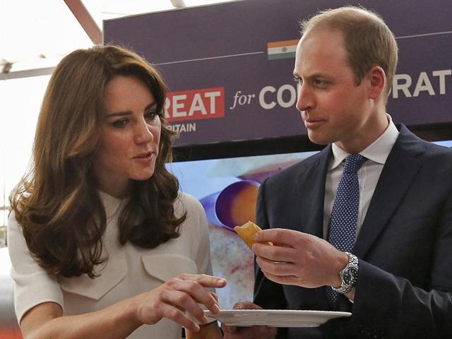 Britain's Prince William eats a "dosa" as his wife Kate Middleton, the Duchess of Cambridge, watches during an event on young entrepreneurs in Mumbai on Monday. (PTI) Britain's Prince William eats a "dosa" as his wife Kate Middleton, the Duchess of Cambridge, watches during an event on young entrepreneurs in Mumbai on Monday. (PTI)