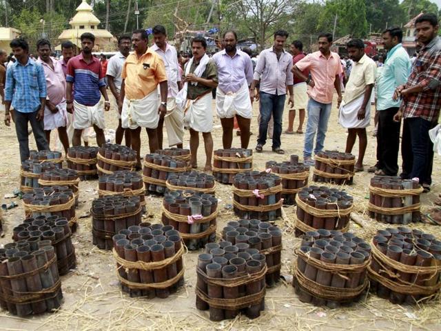 The fire blaze at the Puttingal Devi Temple on Sunday claimed dozens of lives and damaged buildings in the area. Temples across the state have decided to avoid firecrackers during festivities. (Sarath Sreekanteswaram/HT Photo) The fire blaze at the Puttingal Devi Temple on Sunday claimed dozens of lives and damaged buildings in the area. Temples across the state have decided to avoid firecrackers during festivities. (Sarath Sreekanteswaram/HT Photo)