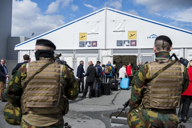 Belgian soldiers keep guard at Brussels Airport, which partially re-open after a bomb blast killed dozens in March. (Reuters file) Belgian soldiers keep guard at Brussels Airport, which partially re-open after a bomb blast killed dozens in March. (Reuters file)