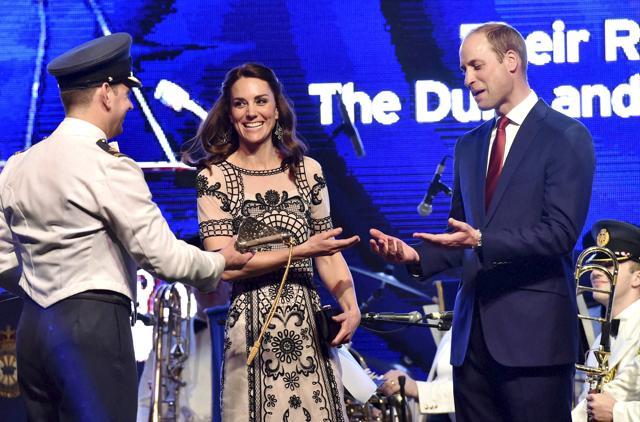 Britain's Prince William, Duke of Cambridge and his wife Catherine, Duchess of Cambridge, attend a garden party celebrating the Queen's 90th birthday. (REUTERS) Britain's Prince William, Duke of Cambridge and his wife Catherine, Duchess of Cambridge, attend a garden party celebrating the Queen's 90th birthday. (REUTERS)