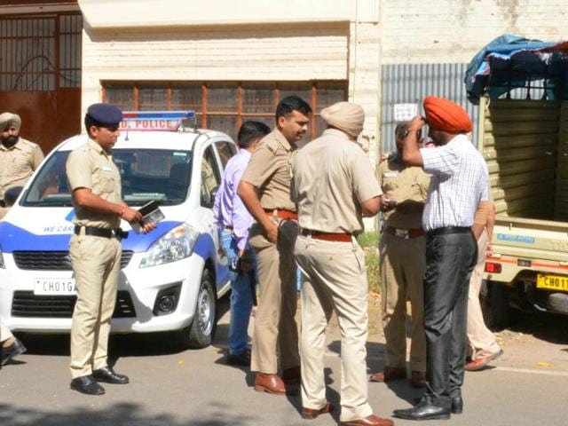 Police near the crime scene on Tuesday (HT Photo) Police near the crime scene on Tuesday (HT Photo)