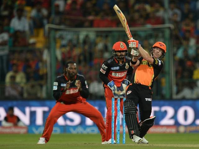 Kedar Jadhav (C) and Chris Gayle (L) look on as Sunrisers Hyderabad batsman David Warner hits a six. (AFP) Kedar Jadhav (C) and Chris Gayle (L) look on as Sunrisers Hyderabad batsman David Warner hits a six. (AFP)