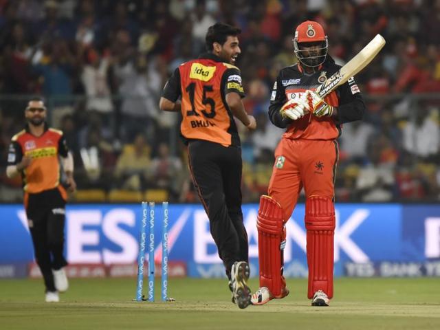 Sunrisers Hyderabad’s Bhuveneshwer Kumar celebrates after bowling Chris Gayle around his legs in the second over. (Ravi Choudhary/HT Photo) Sunrisers Hyderabad’s Bhuveneshwer Kumar celebrates after bowling Chris Gayle around his legs in the second over. (Ravi Choudhary/HT Photo)