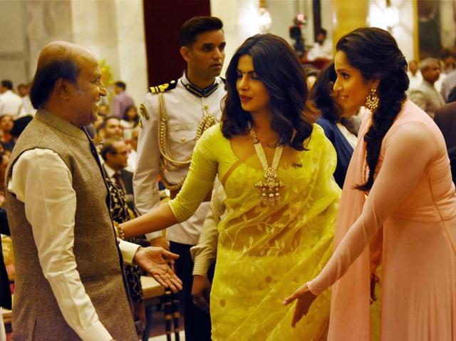 Rajinikanth shares a light moment with Priyanka and Sania during the Padma Awards. (PTI) Rajinikanth shares a light moment with Priyanka and Sania during the Padma Awards. (PTI)
