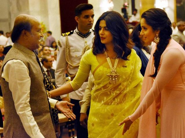 Priyanka Chopra with Sania Mirza and Rajinikanth before receiving their Padma awards during the ceremony at Rashtrapati Bhawan in New Delhi.(Arvind Yadav/HT photo)