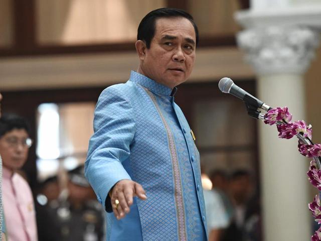 Thai Prime Minister Prayuth Chan-ocha addresses officials during the Songkran - or Thai new year - merit-making ceremony at Government House in Bangkok on Tuesday. (AFP) Thai Prime Minister Prayuth Chan-ocha addresses officials during the Songkran - or Thai new year - merit-making ceremony at Government House in Bangkok on Tuesday. (AFP)