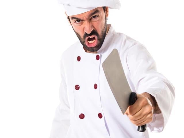 Representative image of a chef holding a cleaver knife(Photo: Shutterstock)