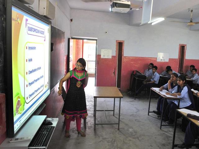 A Smart class in progress at Government Model School, Sector 19, in Chandigarh on Tuesday.(Keshav Singh/HT) A Smart class in progress at Government Model School, Sector 19, in Chandigarh on Tuesday.(Keshav Singh/HT)