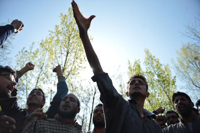 Kashmiri villagers shout pro-freedom slogans during the funeral of Raja Bejum, 70, who was killed in clashes with security forces in Langate near Handwara on Wednesday. At least four have been killed in the clashes between security personnel and protesters enraged by the alleged molestation of a girl. (AFP) 