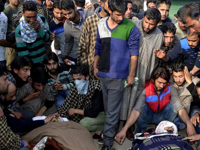 Kashmiri villagers surround the bodies of two civillians reported to have been killed in clashes with security personnel in Handwara, north-west of Srinagar, on April 12, 2016. (AFP) Kashmiri villagers surround the bodies of two civillians reported to have been killed in clashes with security personnel in Handwara, north-west of Srinagar, on April 12, 2016. (AFP)