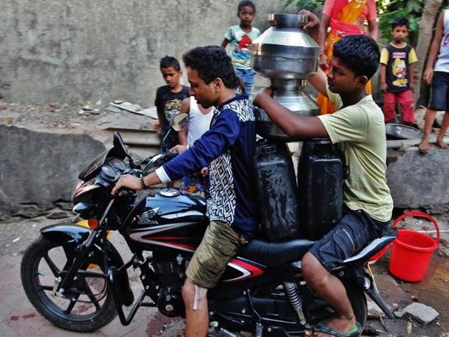 Water cuts across city have forced people to stock up.(PRAFUL GANGURDE) Water cuts across city have forced people to stock up.(PRAFUL GANGURDE)