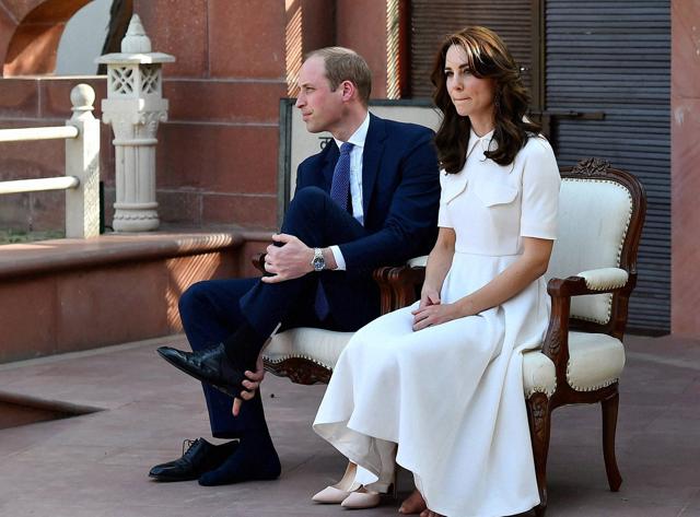 Prince William and Kate Middleton put off their shoes before paying homage to Mahatma Gandhi during a visit to 'Gandhi Smriti in New Delhi on Monday. (PTI) Prince William and Kate Middleton put off their shoes before paying homage to Mahatma Gandhi during a visit to 'Gandhi Smriti in New Delhi on Monday. (PTI)