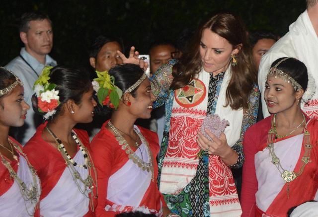 Kate Middleton interacts with the girls of Jhoomar dance cultural troop at Diphlu River Lodge at Kaziranga National Park of Assam. (PTI Photo) Kate Middleton interacts with the girls of Jhoomar dance cultural troop at Diphlu River Lodge at Kaziranga National Park of Assam. (PTI Photo)