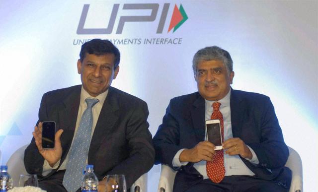 NPCI adviser Nandan Nilekani with RBI governor Raghuram Rajan at the launch of Unified Payments Interface (UPI) in Mumbai. (PTI) NPCI adviser Nandan Nilekani with RBI governor Raghuram Rajan at the launch of Unified Payments Interface (UPI) in Mumbai. (PTI)