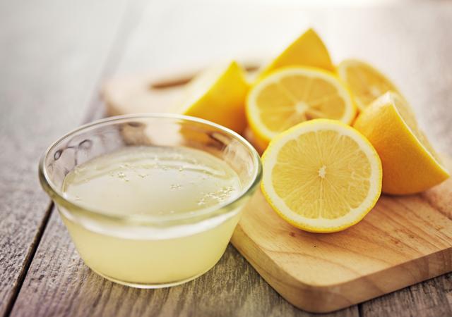 Squeeze some lemon in your drink for a bout of freshness. (Shutterstock)