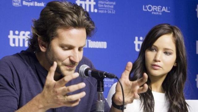 Jennifer Lawrence and Bradley Cooper promoting Silver Linings Playbook. Cooper came out in support of Lawrence. Jennifer Lawrence and Bradley Cooper promoting Silver Linings Playbook. Cooper came out in support of Lawrence.