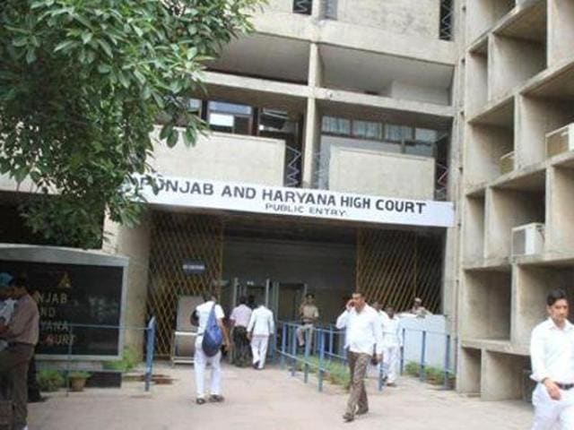 His services could have been terminated with an innocuous order but the order dispensing his services is stigmatic in nature, on account of the lodging of the FIR and on the ground that he committed an offence of moral turpitude, the high court bench observed.(HT Photo) His services could have been terminated with an innocuous order but the order dispensing his services is stigmatic in nature, on account of the lodging of the FIR and on the ground that he committed an offence of moral turpitude, the high court bench observed.(HT Photo)