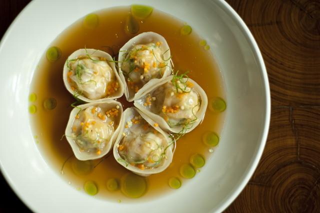 Chef Alex Sanchez’s signature dish - shrimp dumplings, spicy ginger broth, scallion oil Chef Alex Sanchez’s signature dish - shrimp dumplings, spicy ginger broth, scallion oil
