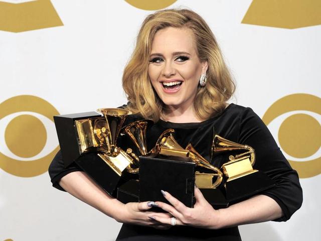 In this file photo, Adele poses backstage with her six awards at the 54th annual Grammy Awards. According to figures released Tuesday, Adele had the world's best-selling album last year, as the British singer's ‘25’ sold 17.4 million copies. (AP) In this file photo, Adele poses backstage with her six awards at the 54th annual Grammy Awards. According to figures released Tuesday, Adele had the world's best-selling album last year, as the British singer's ‘25’ sold 17.4 million copies. (AP)