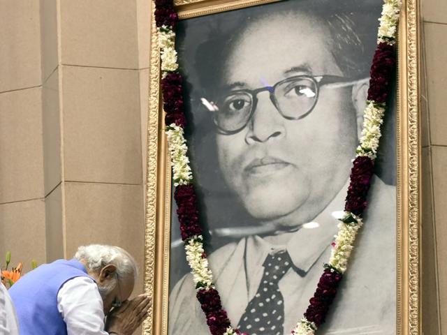 File photo of Prime Minister Narendra Modi paying homage to Dr Ambedkar before laying foundation stone of Dr. Ambedkar National Memorial at Vigyan Bhavan in New Delhi.(Mohd Zakir/HT Photo)