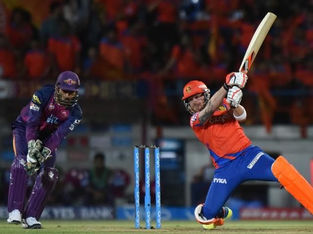 Brendon McCullum hits a shot as Pune keeper MS Dhoni watches. (Pratham Gokhale/HT Photo) Brendon McCullum hits a shot as Pune keeper MS Dhoni watches. (Pratham Gokhale/HT Photo)