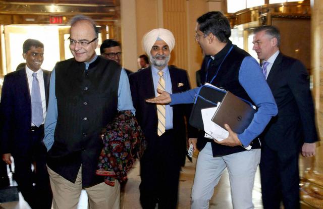 Finance Minister Arun Jaitley with Chief Economic Adviser (CEA) Arvind Subramanian and Taranjit Sandhu, Deputy Chief of Mission to Washington arrives his hotel in Washington DC on Wednesday. (PTI) Finance Minister Arun Jaitley with Chief Economic Adviser (CEA) Arvind Subramanian and Taranjit Sandhu, Deputy Chief of Mission to Washington arrives his hotel in Washington DC on Wednesday. (PTI)
