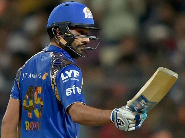 Mumbai Indian batsman Rohit Sharma acknowledges the cheers from the crowd after completing his half century. (PTI Photo) Mumbai Indian batsman Rohit Sharma acknowledges the cheers from the crowd after completing his half century. (PTI Photo)