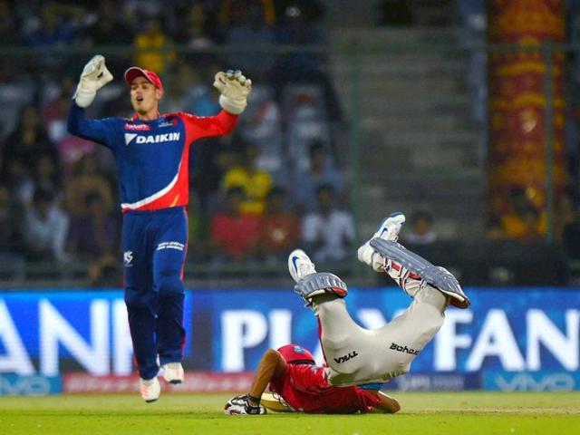 Axar Patel dives to complete a run. (PTI)