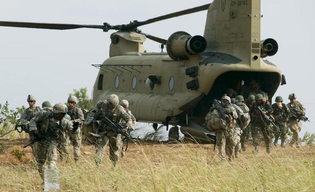 File photo of US soldiers disembarking from a military helicopter while taking part in the annual "Balikatan" (shoulder-to-shoulder) war game with Filipino soldiers in April 2015. (Reuters) File photo of US soldiers disembarking from a military helicopter while taking part in the annual "Balikatan" (shoulder-to-shoulder) war game with Filipino soldiers in April 2015. (Reuters)