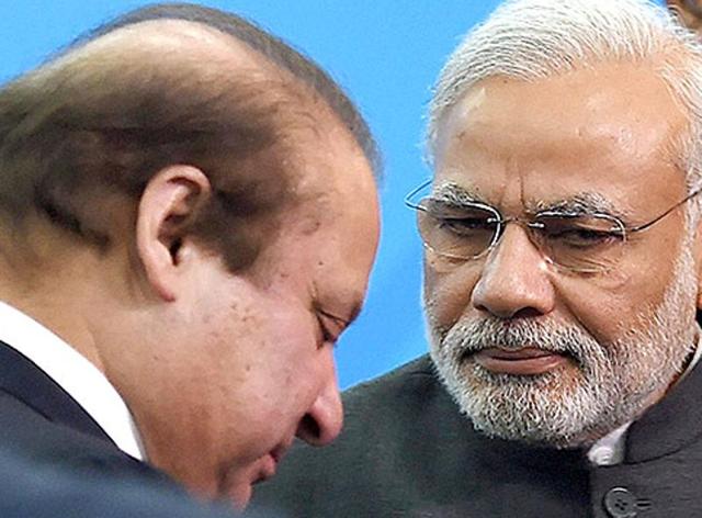 Prime Minister Narendra Modi and his Pakistani counterpart Nawaz Sharif talk in Paris on the sidelines of CoP 21 summit on climate change. (PTI) Prime Minister Narendra Modi and his Pakistani counterpart Nawaz Sharif talk in Paris on the sidelines of CoP 21 summit on climate change. (PTI)