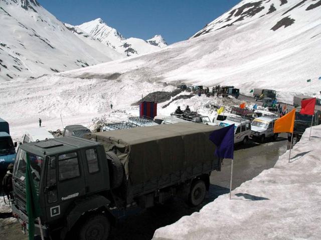 An army convoy with essential supplies is seen at the Zojila Pass. (PTI File Photo) An army convoy with essential supplies is seen at the Zojila Pass. (PTI File Photo)