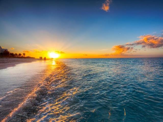 Grace Bay Beach, Turks and Caicos: The 12 miles of silky white powder and turquoise water are so unreal, they look Photoshopped. Plus, you’ll have access to the Western Hemisphere’s third-largest barrier reef: Diving, snorkeling, bonefishing, and windsurfing are practically religions on these isles. (Shutterstock) Grace Bay Beach, Turks and Caicos: The 12 miles of silky white powder and turquoise water are so unreal, they look Photoshopped. Plus, you’ll have access to the Western Hemisphere’s third-largest barrier reef: Diving, snorkeling, bonefishing, and windsurfing are practically religions on these isles. (Shutterstock)