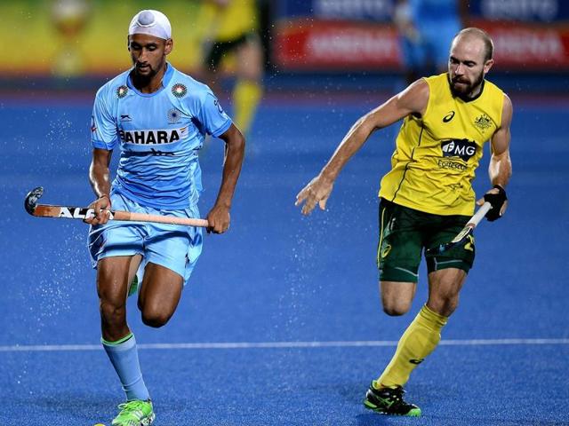 Australia's Matthew Swann (R) vies for the ball with Mandeep Singh of India (L) during the final of the 2016 Sultan Azlan Shah Cup in Malaysia's northern town of Ipoh on April 16, 2016. (AFP) Australia's Matthew Swann (R) vies for the ball with Mandeep Singh of India (L) during the final of the 2016 Sultan Azlan Shah Cup in Malaysia's northern town of Ipoh on April 16, 2016. (AFP)