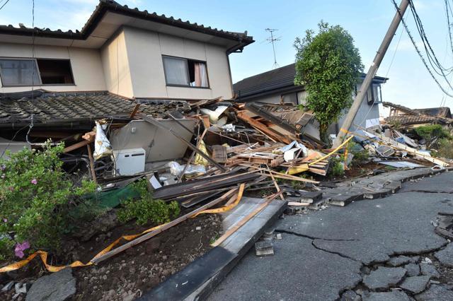Collapsed houses are seen in Mashiki, Kumamoto prefecture. The powerful shaking set off a huge landslide that swept away homes and cut off a highway in one area, and unlike the earlier quake which mostly affected old houses. Larger buildings were damaged and some toppled across Kumamoto prefecture, the epicentre of the quakes. (AFP) Collapsed houses are seen in Mashiki, Kumamoto prefecture. The powerful shaking set off a huge landslide that swept away homes and cut off a highway in one area, and unlike the earlier quake which mostly affected old houses. Larger buildings were damaged and some toppled across Kumamoto prefecture, the epicentre of the quakes. (AFP)