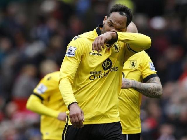 Aston Villa's Aly Cissokho (L) looks dejected at the end of the match after being relegated from the Premier League. (REUTERS) Aston Villa's Aly Cissokho (L) looks dejected at the end of the match after being relegated from the Premier League. (REUTERS)