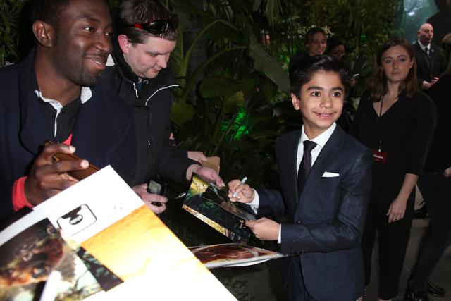 Actor Neel Sethi signs autographs upon arrival at the premiere of the film Jungle Book in London, Wednesday, April 13, 2016. (Joel Ryan/Invision/AP) Actor Neel Sethi signs autographs upon arrival at the premiere of the film Jungle Book in London, Wednesday, April 13, 2016. (Joel Ryan/Invision/AP)