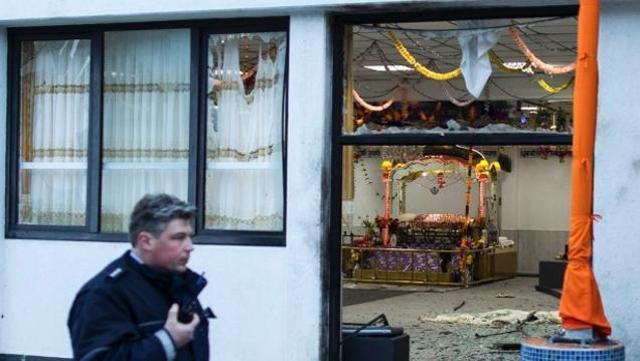 A German policeman stands guard at a gurdwara in the western city of Essen. (German Media)