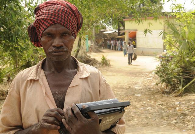 Som Mardi, a tribal listening to election updates through radio at the tribal village Murgabuni, Bolpur in Birbhum district. (Subhendu Ghosh/HT Photo) Som Mardi, a tribal listening to election updates through radio at the tribal village Murgabuni, Bolpur in Birbhum district. (Subhendu Ghosh/HT Photo)