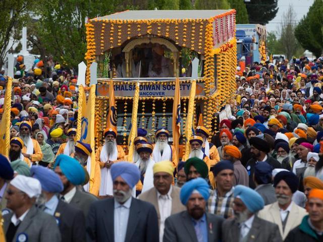 Thousands marched together during the annual Baisakhi parade in Vancouver on Saturday.