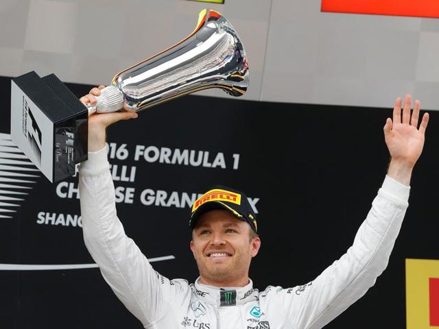 Mercedes driver Nico Rosberg of Germany, center, leaps while celebrating his win with Ferrari driver Sebastian Vettel of Germany, left, and Red Bull driver Daniil Kvyat of Russia, right, in the Chinese Grand Prix. (AP) Mercedes driver Nico Rosberg of Germany, center, leaps while celebrating his win with Ferrari driver Sebastian Vettel of Germany, left, and Red Bull driver Daniil Kvyat of Russia, right, in the Chinese Grand Prix. (AP)