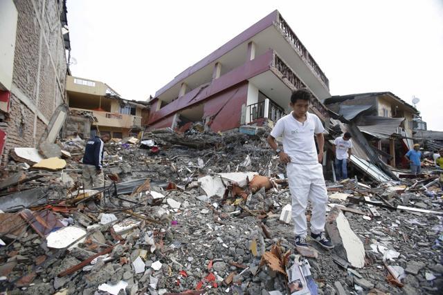 People search for their belongings amid the debris of their destroyed homes. (AP Photo) People search for their belongings amid the debris of their destroyed homes. (AP Photo)