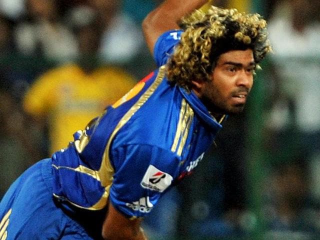 Former Sri Lankan T20 cricket captain Lasith Malinga looks on during a departure ceremony in Colombo.(AFP Photo)