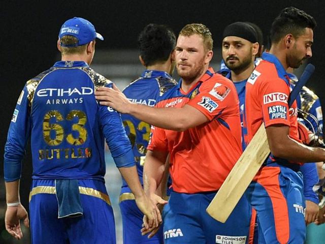 Gujarat Lions batsman Aaron Finch and Dhawal Kulkarni shake hands with Mumbai Indians players after their win in the IPL match at Mumbai’s Wankhede Stadium on April 17, 2016. (PTI) Gujarat Lions batsman Aaron Finch and Dhawal Kulkarni shake hands with Mumbai Indians players after their win in the IPL match at Mumbai’s Wankhede Stadium on April 17, 2016. (PTI)